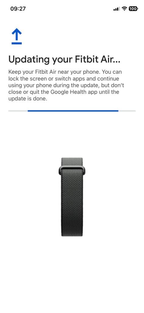 Fitbit Air firmware update installing in the Google Health app on an iPhone