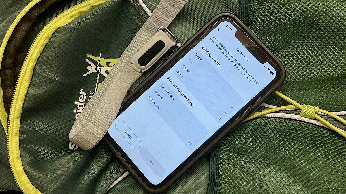 Google Health custom food logging screen shown beside a Fitbit tracker