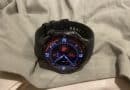 OnePlus Watch 3 on a folded shirt