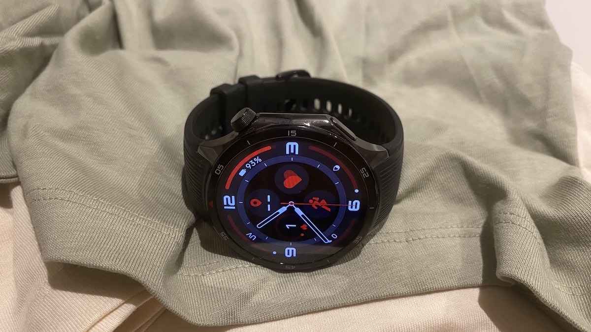 OnePlus Watch 3 on a folded shirt